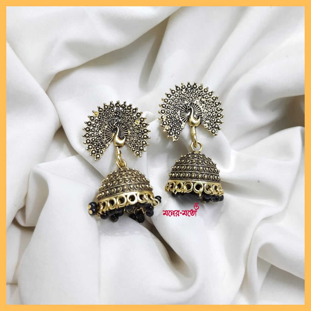 Golden hot sale oxidised jhumka